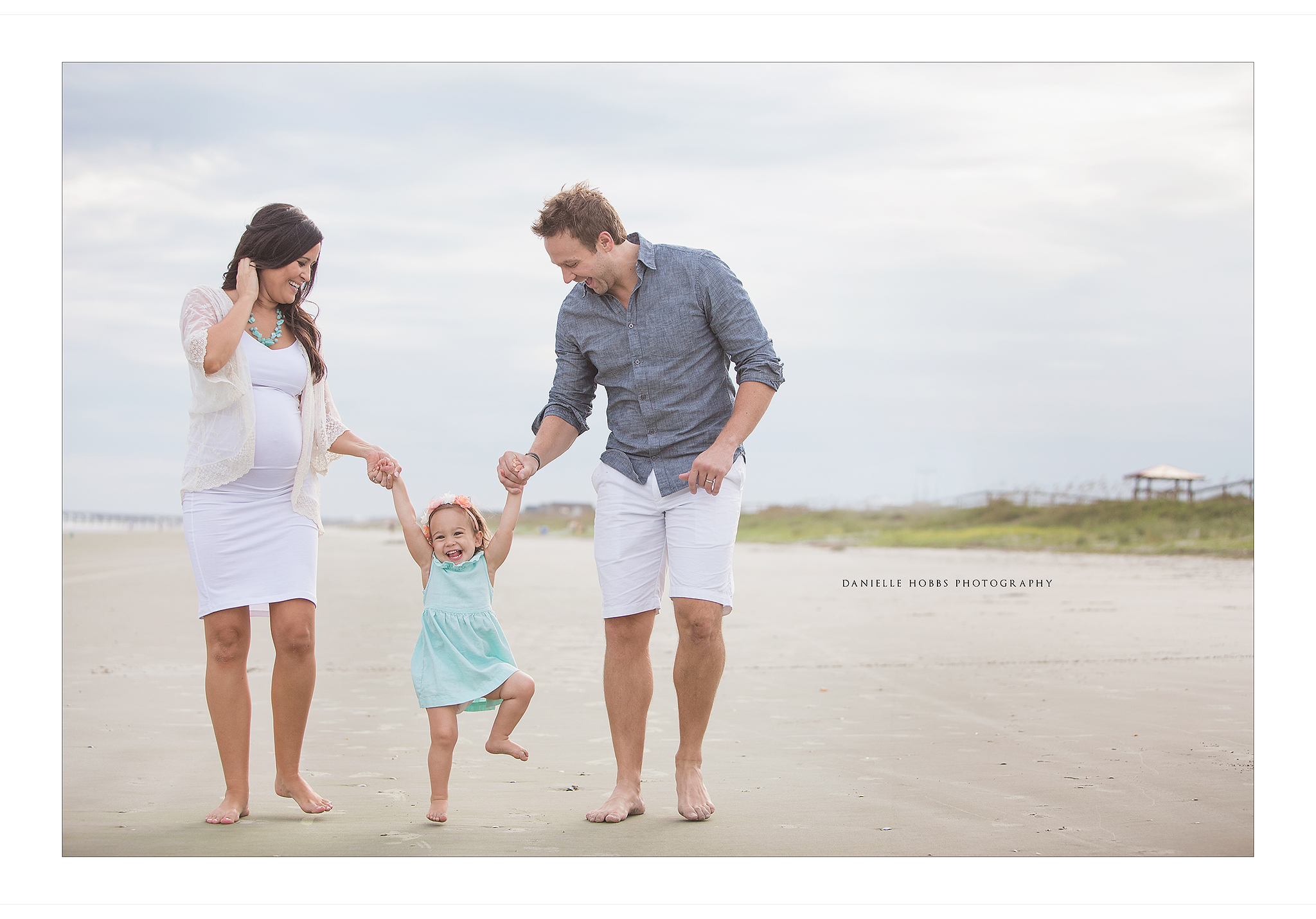 Family maternity session at the beach