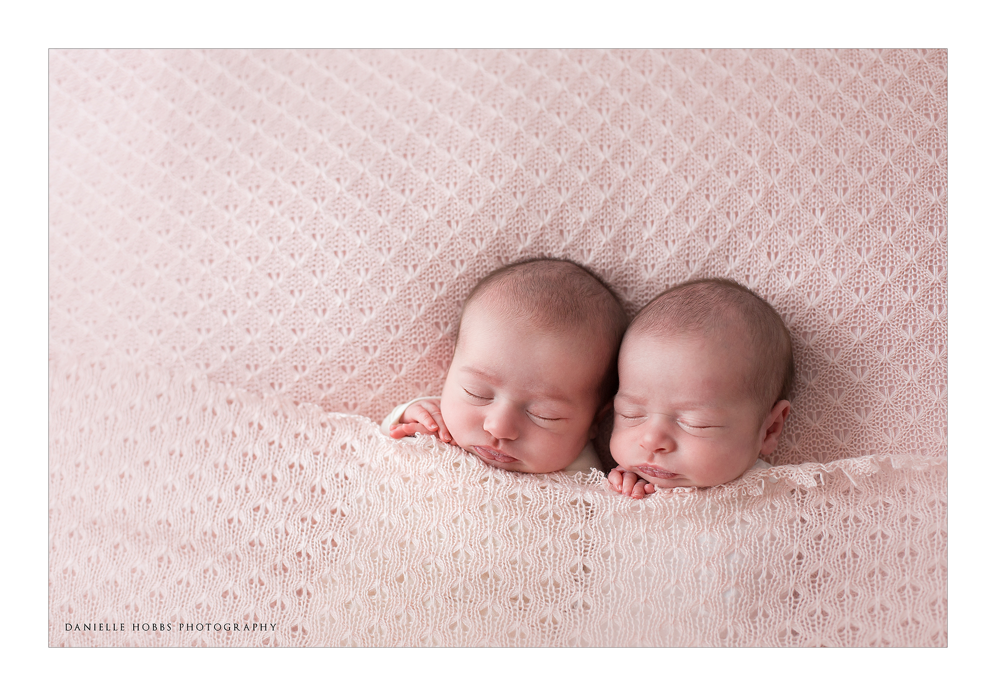 Twin newborn girls on pink blanket Washington DC
