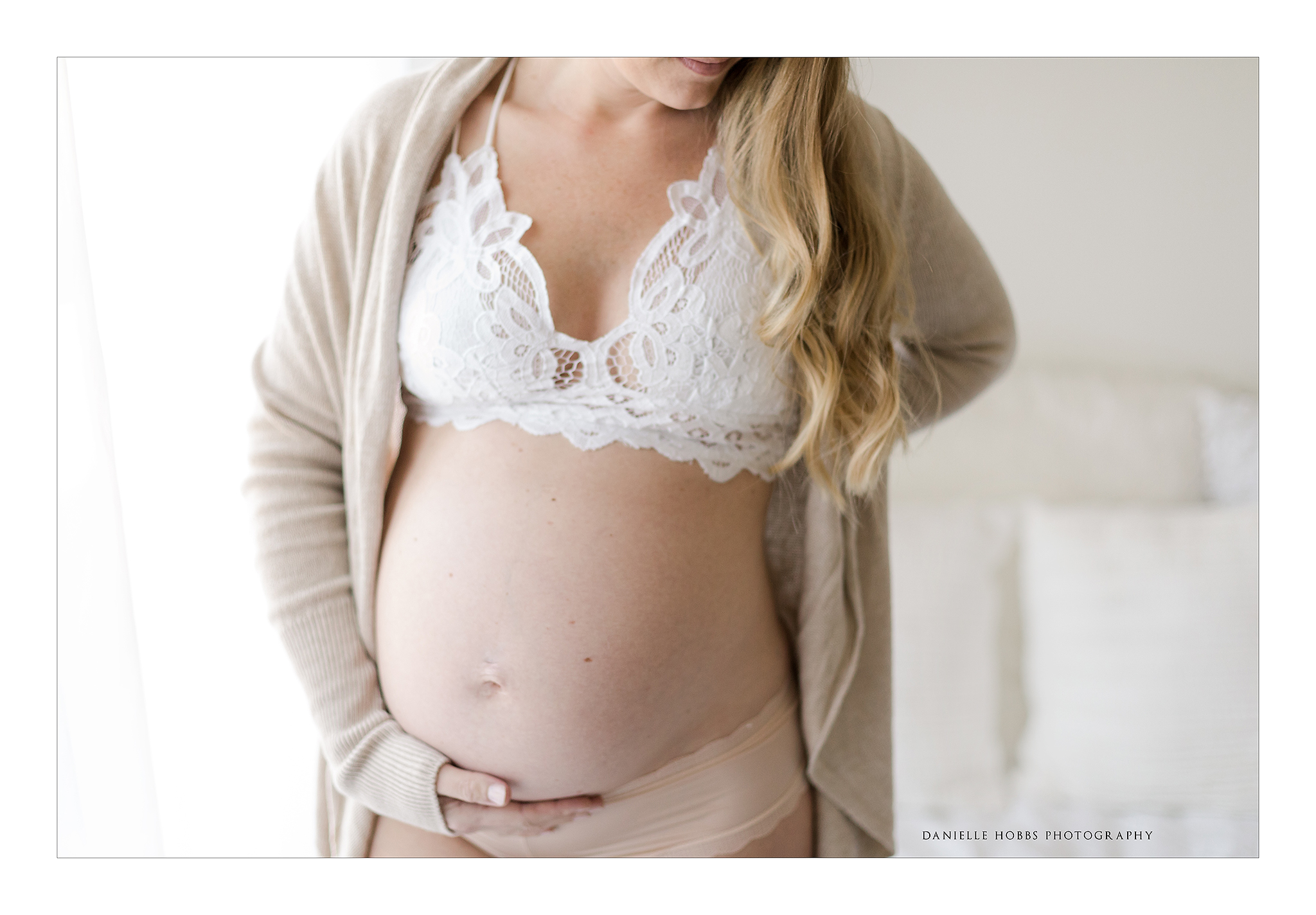 simple maternity photo of baby bump