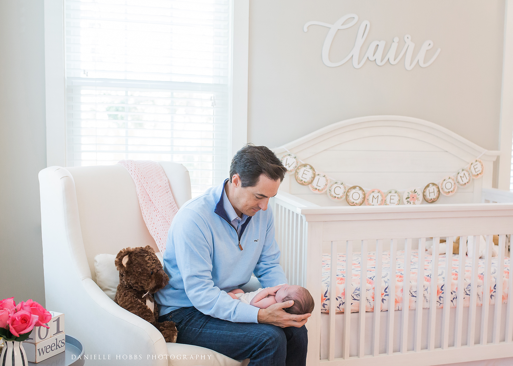 father and daughter in nursery lifestyle portrait