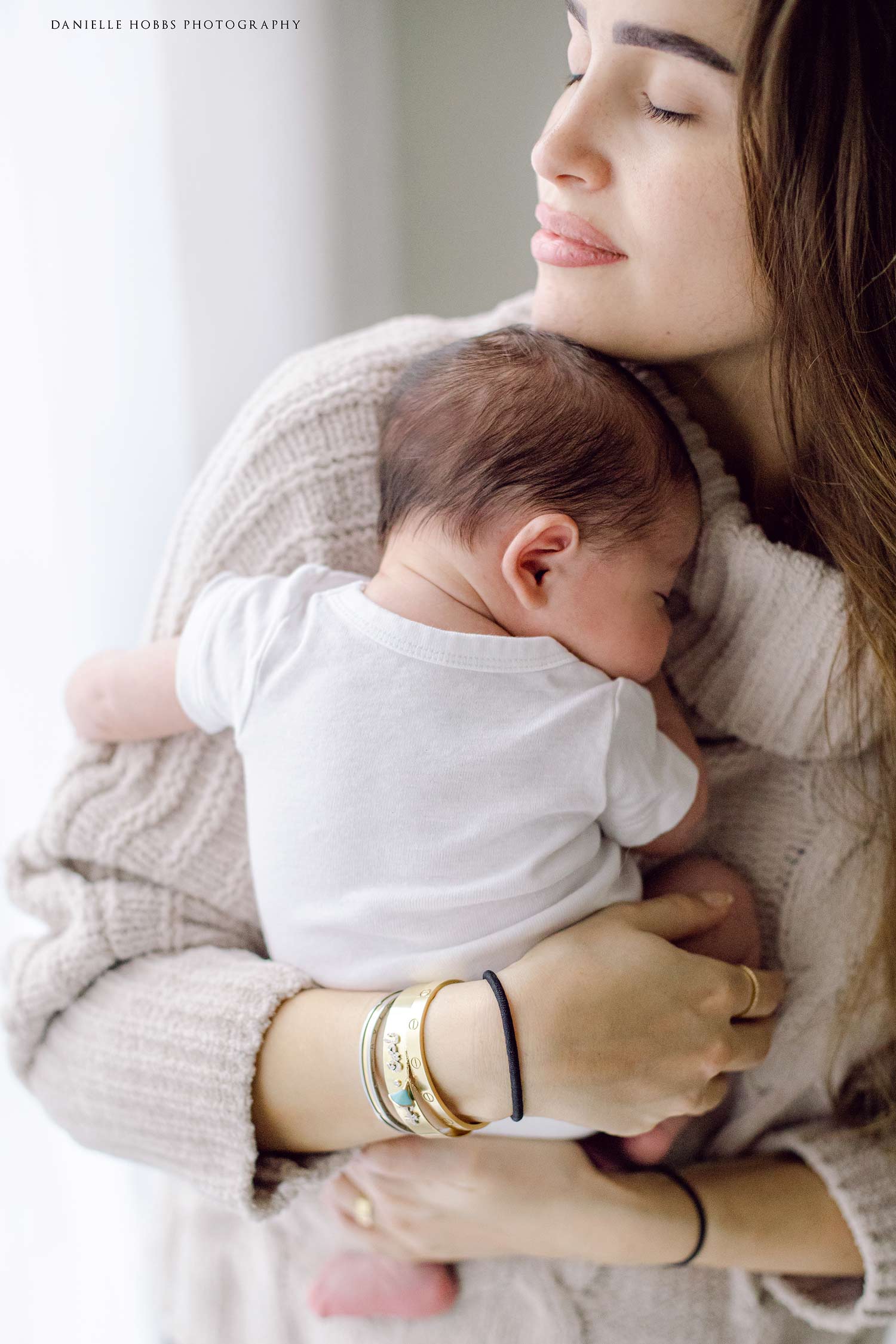 mom holding baby washington dc newborn photographer