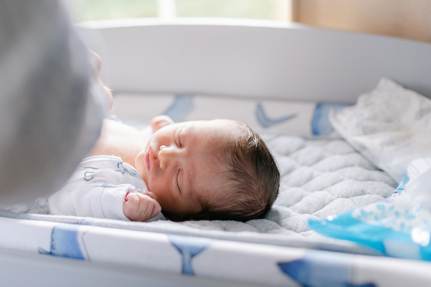 Washington DC Lifestyle Newborn Photographer baby by window